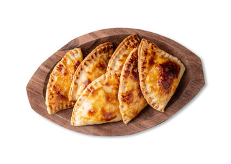 Typical brazilian snack baked pastel on a plate isolated over white background