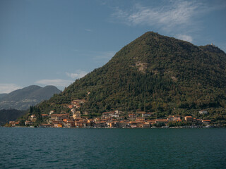 Fototapeta na wymiar Beautiful view of lake Iseo with mountains, Italy
