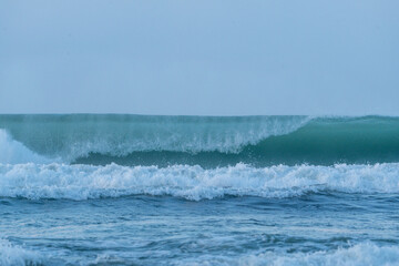 wave breaking on the beach