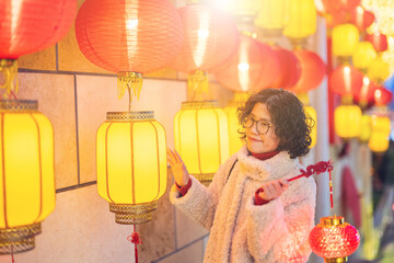 Tourists visiting the lantern festival during the Spring Festival with portable lanterns