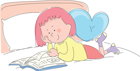 Little girl lying on her bed reading a book.