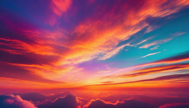 Beautiful sunset sky above the fluffy clouds illuminated in vibrant colors. Natural summer cloudscape