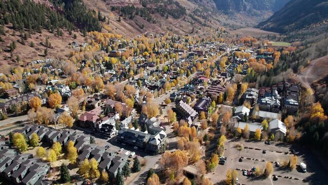Slow flying drone shot over telluride, CO on a warm day in the fall