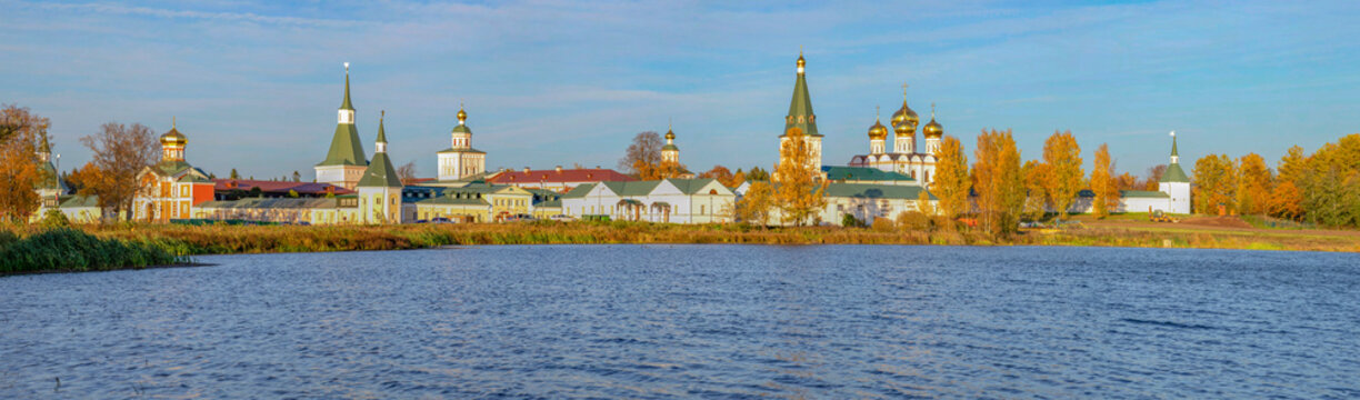 Panorama of the Iversky Svyatoozersky Monastery on the lake shore. Valdai, Novgorod region. Russia