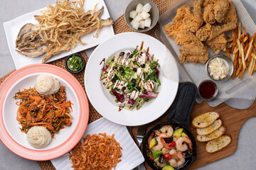 Muktae, snacks, sea snail, fried chicken, salad, ricotta cheese, freshwater shrimp, fried food, gambas, noodle soup,