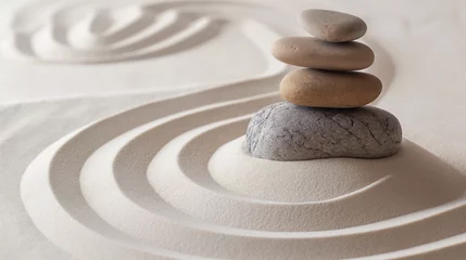Photo sur Aluminium Pierres dans le sable Zen stones with lines in the sand harmony and peace spa background. Therapy concept. 