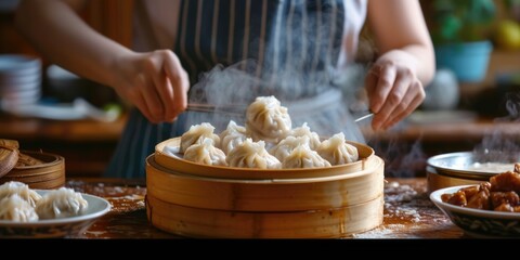 A woman in a blue apron is cooking dumplings. This image can be used to showcase culinary skills or in recipes and cooking tutorials