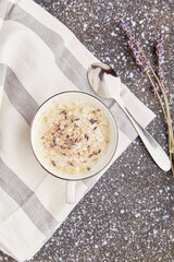  Aesthetic stylish lavender coffee with flowers flat lay