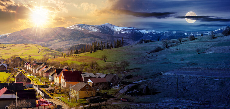 carpathian rural landscape in springtime. ukrainian village in the valley. arable on the alpine hill. snow capped mountain in the distance. day and night time change on spring equinox concept