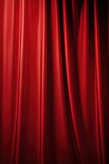 Fototapeta premium Red curtain close up on a black background. Perfect for theater, events, and interior design