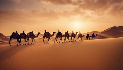 Camels moving in single file across the Arabian desert at sunset