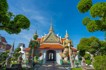 Statues of Giants in gate of temple demon guardians at Wat Arun