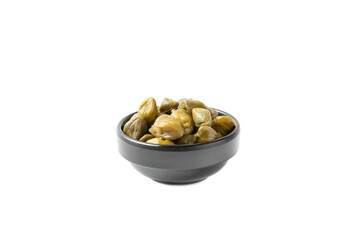 Capers in a bowl isolated on a white background. Marinated caper buds, small salted capparis in bowl, fermented food, pickled capers group.Organic spices and seasonings.