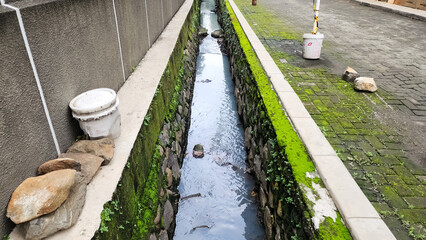 sewer view in one of the big cities in Indonesia. Quite clean.