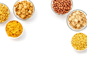 Cereals and flakes from corn and oat on white background top view mockup