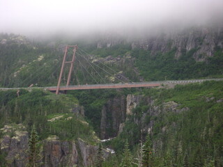 bridge connecting mountains in alaska