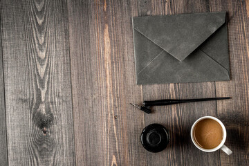 writer workplace with tools on wooden background top view mockup