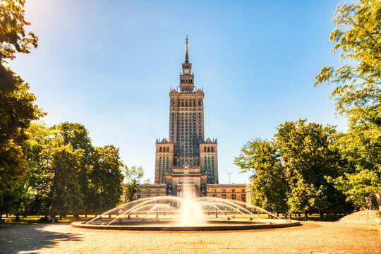 Palace of Culture and Science with Fountain during a Sunny Day in Warsaw