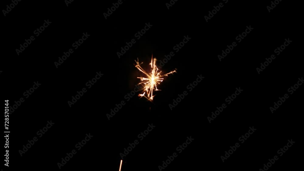 Poster Fireworks bengal Flicker on a dark background. Easy to add lens flare effects for overlay designs or screen blending mode to make high-quality images.