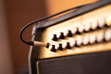 Guitar amplifier on bokeh light colored background, classic vintage rock sound. DSL20c tube amp