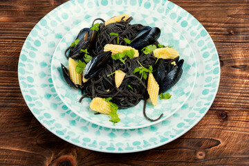 Black spaghetti pasta with mussels.