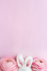 Adorable White Bunny Ears and Pretty Pink Ranunculus Flowers - Perfect for Easter and Other Celebrations