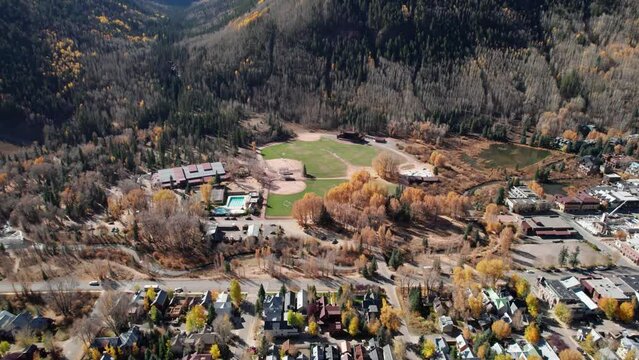 Drone shot looking down over Town Park in Telluride, CO on a sunny day in fall