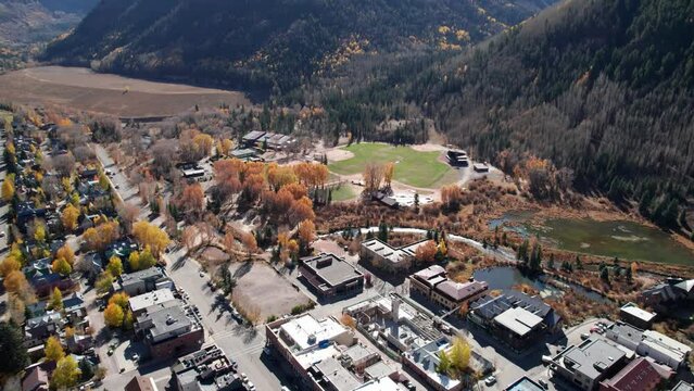 Drone shot orbiting around Town Park in Telluride, CO in the fall season