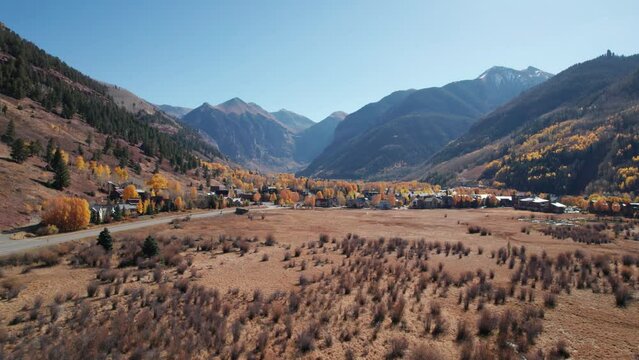 Drone flyover of downtown telluride, CO in the fall on a sunny day
