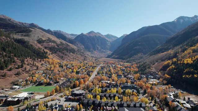 Panning to the left drone shot of telluride, CO in the month of October