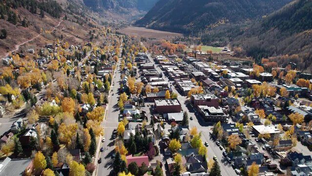 Aerial drone shot angled down at the main street in Telluride, CO