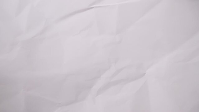 Stop Motion: background of white crumpled paper for background of documentary video