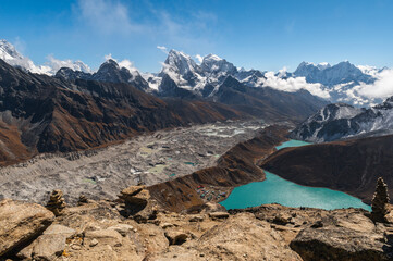 View of Village and Lake Gokyo, snow capped Cholatse, Taboche, Cholatse, Lhotse, Nuptse, Everest,...