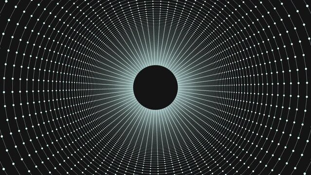 Black and white pattern featuring a circular design with concentric circles of white dots. The central circle echoes this pattern, creating an intriguing and symmetrical visual