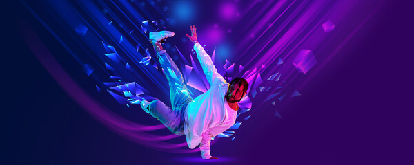 Banner. Breakdance dancer doing friezes and dance tricks against dark background with polygonal and...