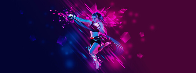 Banner. Young woman, professional boxer training attack technique against gradient blue-pink...