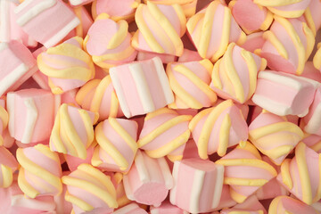 Background or texture of pink marshmallows, top view. Flat layout.