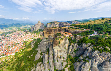 Meteora, Kalabaka, Greece. Saint Stephen Nunnery. Panorama of high rocks and mountains with monasteries. Morning. Aerial view