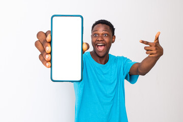 excited black man showing his phone screen