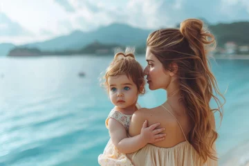 Crédence de cuisine en verre imprimé Mont Cradle A contented mother cradles her precious toddler, their faces radiating pure joy as they stand on a peaceful beach, surrounded by majestic mountains and the endless ocean, enveloped in love and the wa