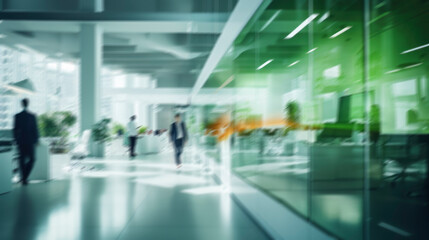 Fototapeta premium Blurred business background. Walking businessmen in a modern glass office center, shopping mall, bank. Movement effect, stylish interior with green plants