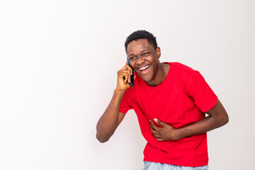 young black man making a phone call laughing