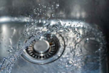 water flowing into the sink
