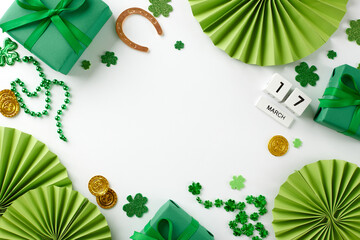 Gleaming greens: Gift options for a happy St. Patrick's. Top view shot of cube calendar, present...