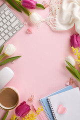 Honoring women's contributions on International Women's Day. Top view vertical shot of keyboard, scarf, notepads, coffee, pen, flowers, hearts on pastel pink background with greetings zone