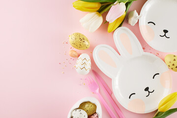 Naklejka na ściany i meble Kids' Easter Extravaganza: Unleashing Egg-citement Delights. Top view shot of bunny shaped plates, eggs, paper cups, cutlery, tulips, sprinkles on pastel pink background with space for festive message
