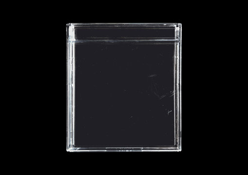Old cartridge tape case on black background. Isolated game transparent mockup. Clean cover box template.