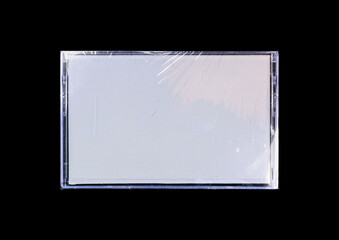 Old cassette tape case on black background. Isolated music transparent mockup. Clean cover box...