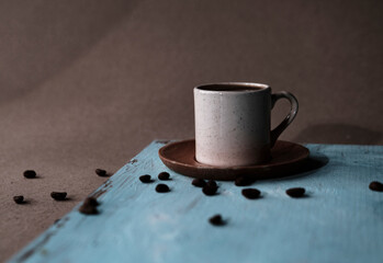 cup of turkish coffee, traditional hot beverage drink, beans, blue wooden background, fortune...