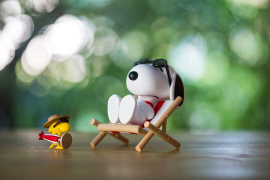 BANGKOK, THAILAND - FEBRUARY 5, 2024 : Snoopy Sunbathing. Snoopy the Best Friends series figures, a size height about 10cm.